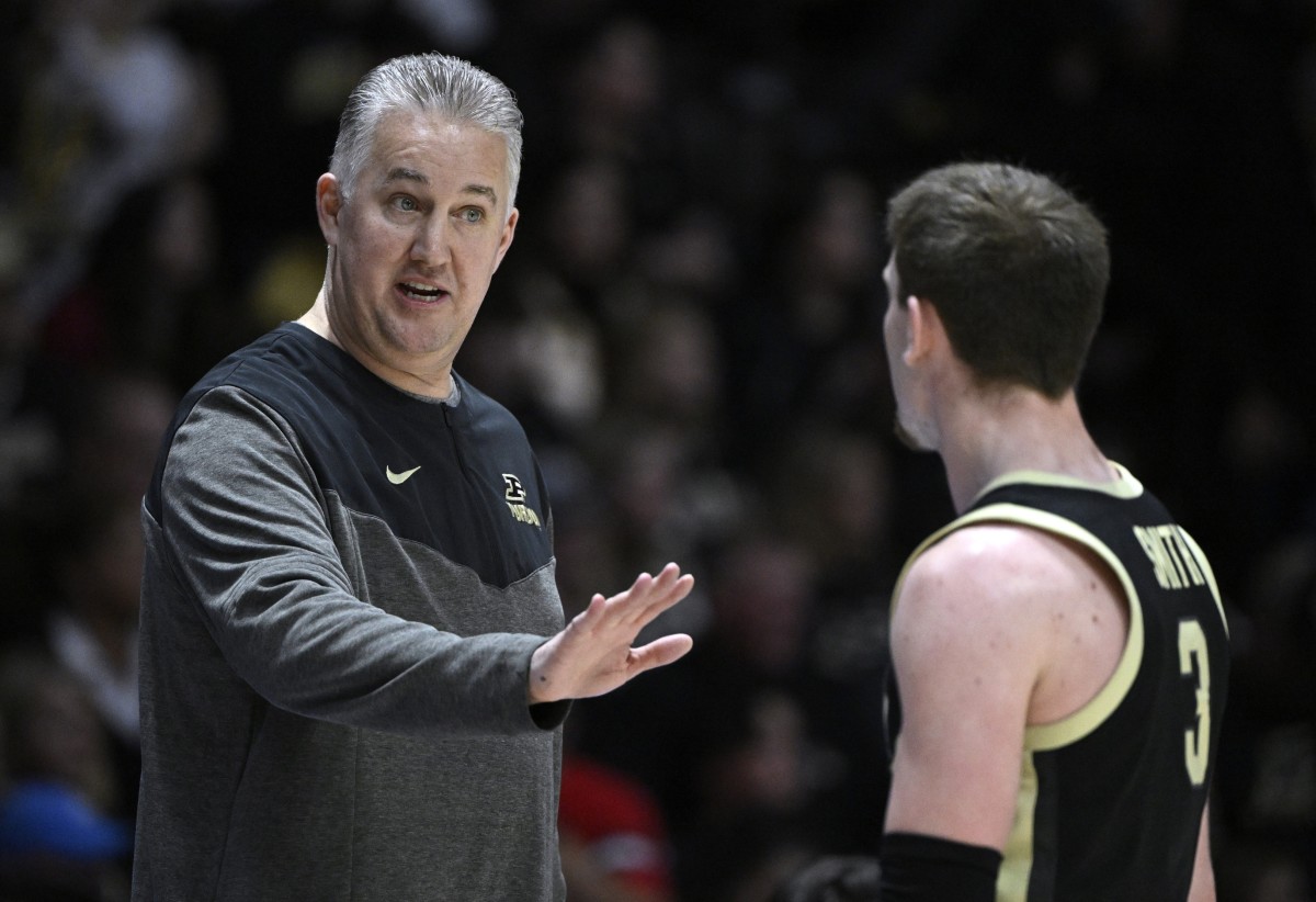 Purdue Boilermakers head coach Matt Painter talks with guard Braden Smith (3) during the first half against the Indiana Hoosiers at Mackey Arena.