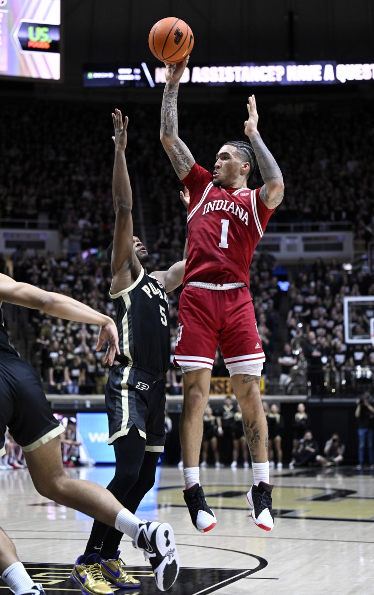 Indiana Hoosiers guard Jalen Hood-Schifino (1) shoots the ball over Purdue Boilermakers guard Brandon Newman (5) during the first half at Mackey Arena.