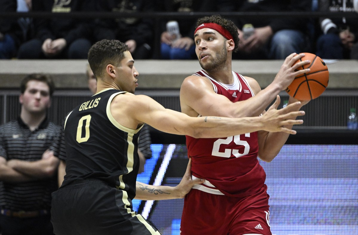 Race Thompson (25) controls the ball against Purdue Boilermakers forward Mason Gillis (0) during the second half at Mackey Arena.