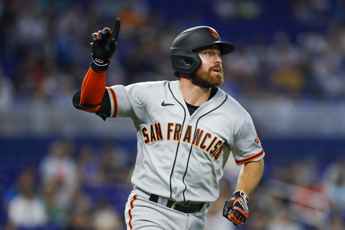 SF Giants shortstop Donovan Walton (37) signals as he circles the bases after hitting a grand slam against the Miami Marlins. (2022)