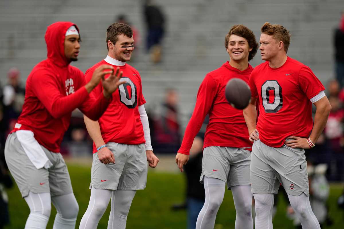 Evanston, Illinois, USA; Ohio State Buckeyes quarterbacks, from left, quarterback C.J. Stroud (7), quarterback Kyle McCord (6), quarterback Mason Maggs (16) and quarterback Devin Brown (15) warm up prior to the NCAA football game against the Northwestern Wildcats at Ryan Field. Mandatory Credit: Adam Cairns-The Columbus Dispatch Ncaa Football Ohio State Buckeyes At Northwestern Wildcats