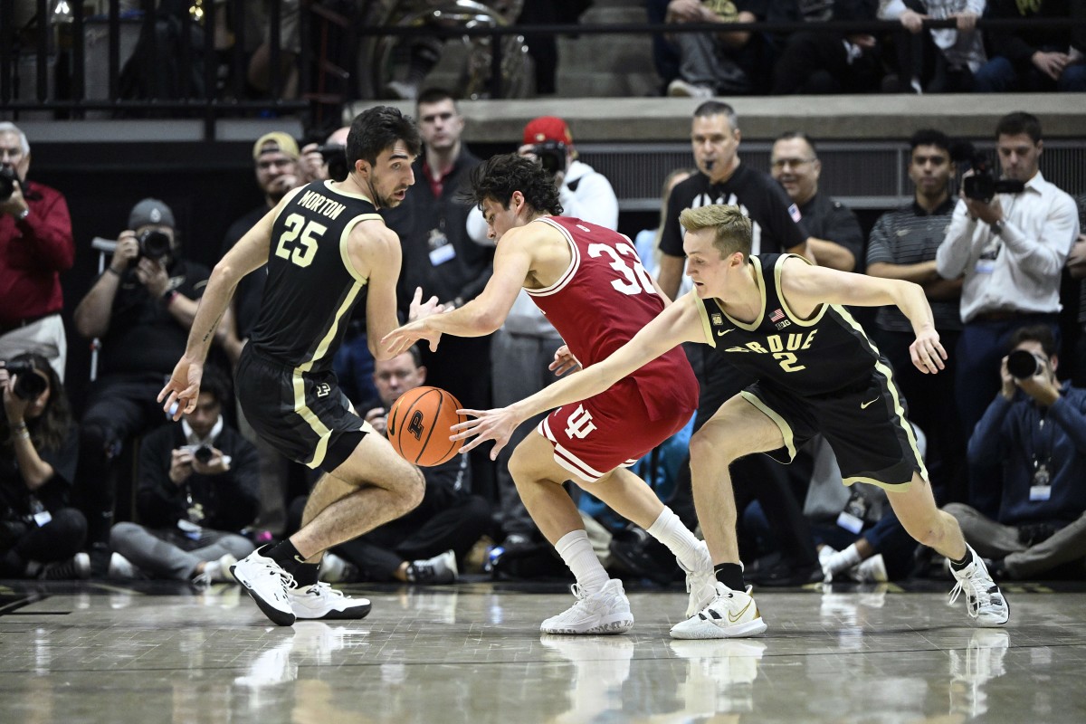 Purdue Boilermakers guard Fletcher Loyer (2) knocks a ball away from Indiana Hoosiers guard Trey Galloway (32).