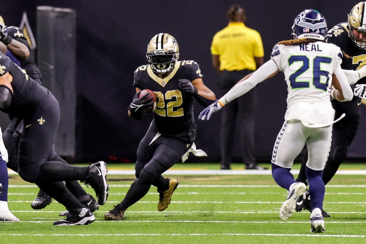Oct 9, 2022; New Orleans Saints running back Mark Ingram II (22) rushes thru the line against the Seattle Seahawks. Mandatory Credit: Stephen Lew-USA TODAY