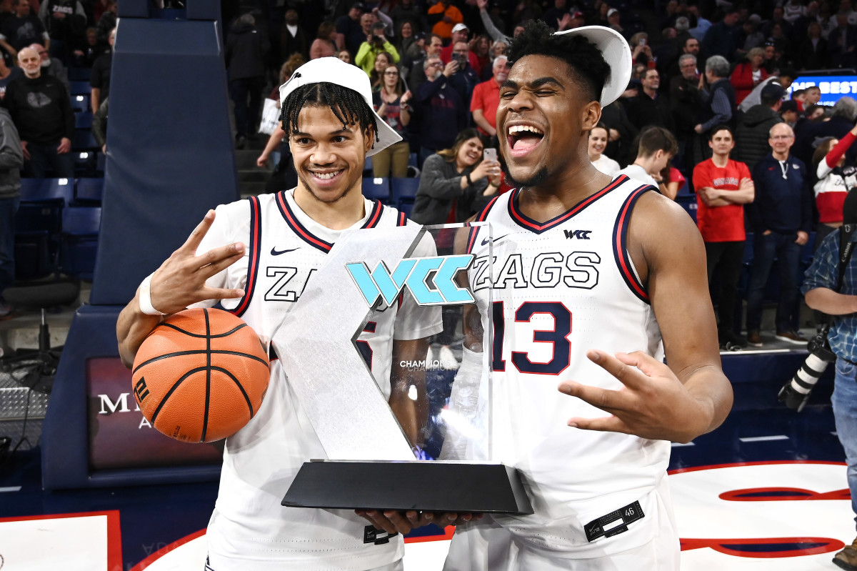 Gonzaga Bulldogs guard Rasir Bolton and guard Malachi Smith  hold up the WCC Regular season trophy