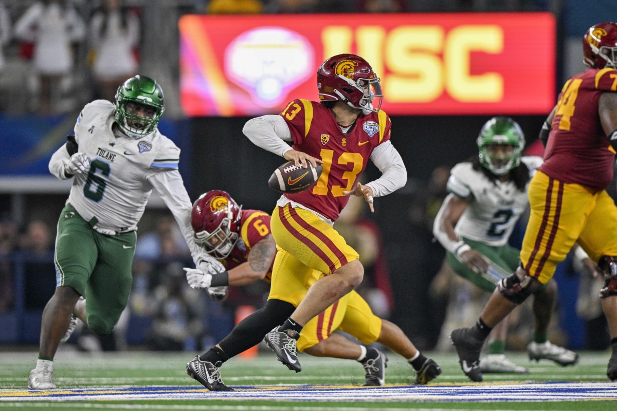 Jan 2, 2023; Arlington, Texas, USA; USC Trojans quarterback Caleb Williams (13) in action during the game between the USC Trojans and the Tulane Green Wave in the 2023 Cotton Bowl at AT&T Stadium. Mandatory Credit: Jerome Miron-USA TODAY Sports