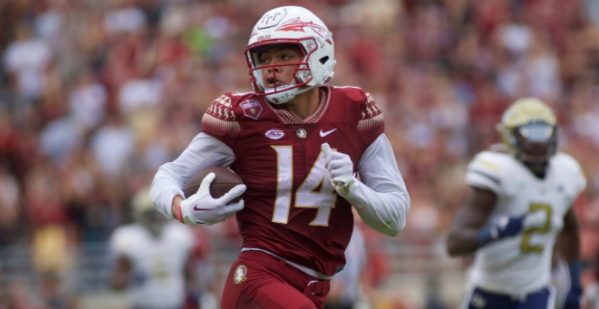 Florida State Seminoles wide receiver Johnny Wilson catches a pass during a college football game in the ACC.