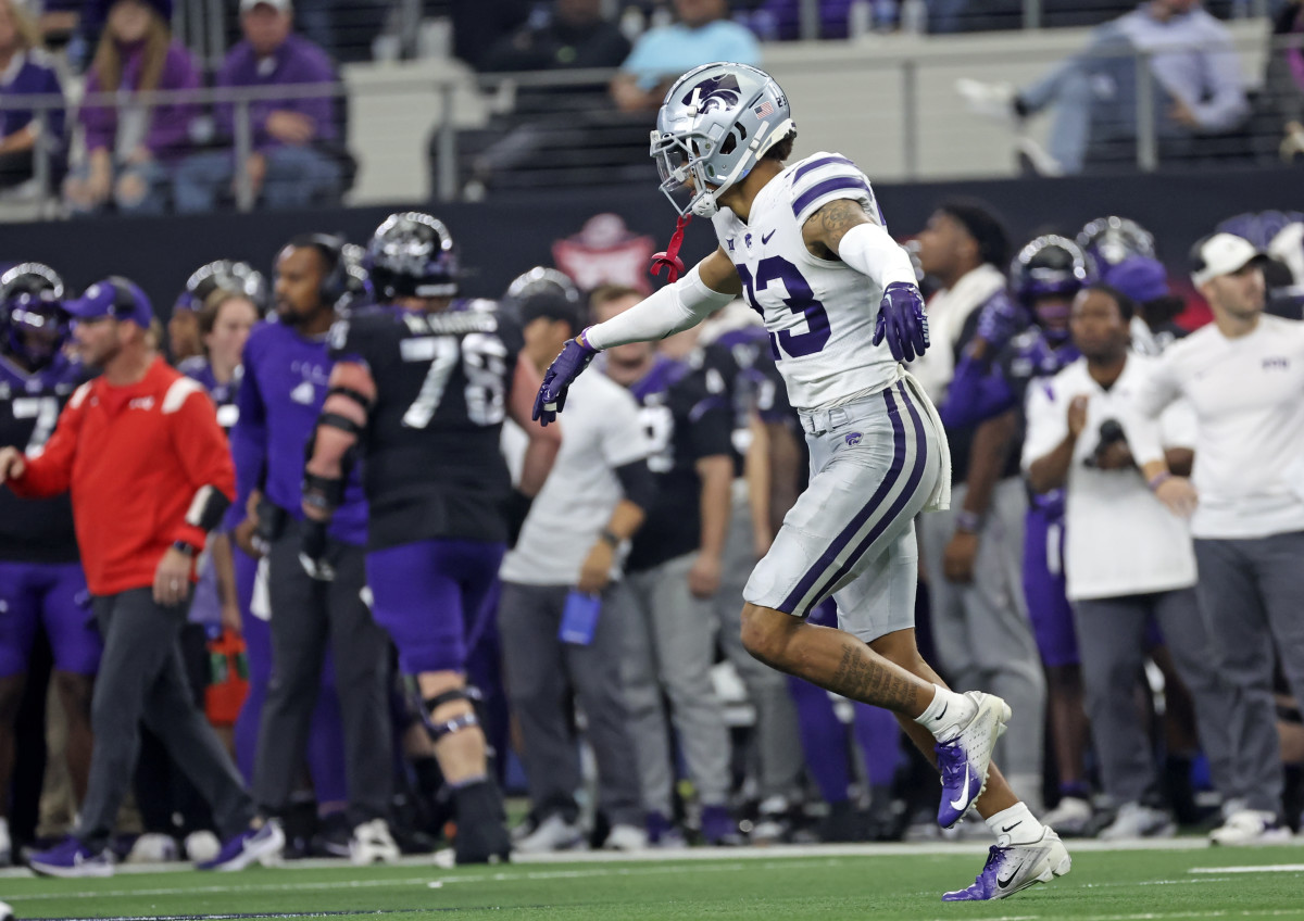 Dec 3, 2022; Arlington, TX, USA; Kansas State Wildcats cornerback Julius Brents (23) reacts after making an interception during the second half against the TCU Horned Frogs at AT&T Stadium. Mandatory Credit: Kevin Jairaj-USA TODAY Sports