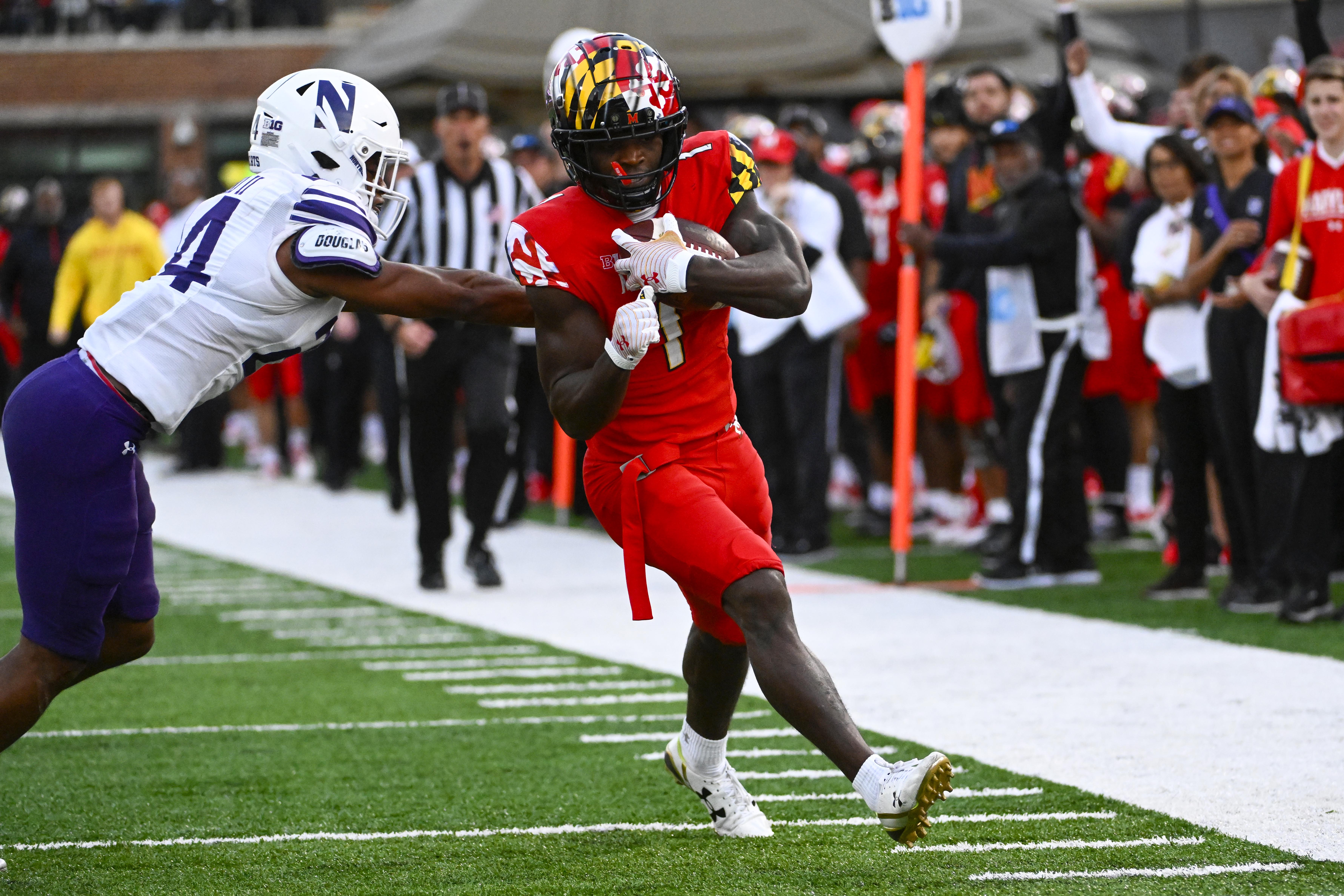 Oct 22, 2022; College Park, Maryland, USA; Maryland Terrapins wide receiver Rakim Jarrett (1) scores a touchdown against the Northwestern Wildcats during the second half at SECU Stadium. Mandatory Credit: Brad Mills-USA TODAY Sports