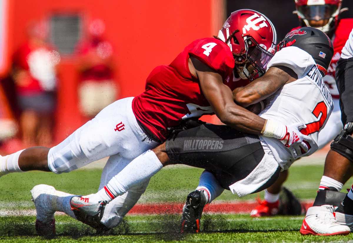 Indiana's Cam Jones (4) tackles Davion Ervin-Poindexter (2) during the Indiana versus Western Kentucky football game at Memorial Stadium on Sept. 17, 2022. Iu Wk Fb 1h Jones 2