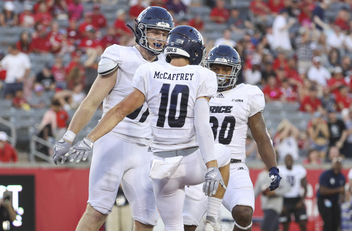 Houston, Texas, USA; Rice Owls wide receiver Luke McCaffrey (10) celebrates with tight end Jack Bradley (87) after scoring a touchdown during the third quarter against the Houston Cougars at TDECU Stadium.