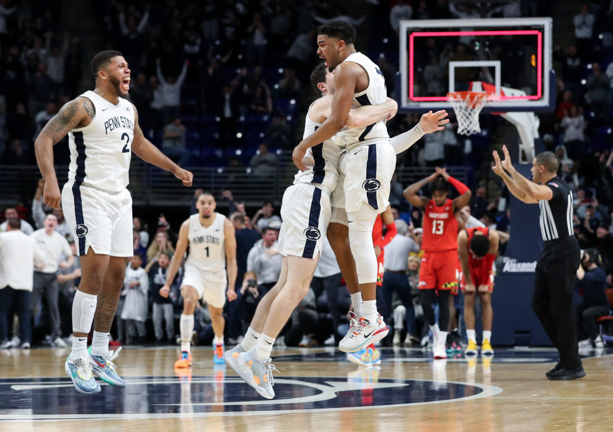 Penn State players celebrate their last-second win over Maryland in a Big Ten basketball game at the Bryce Jordan Center.