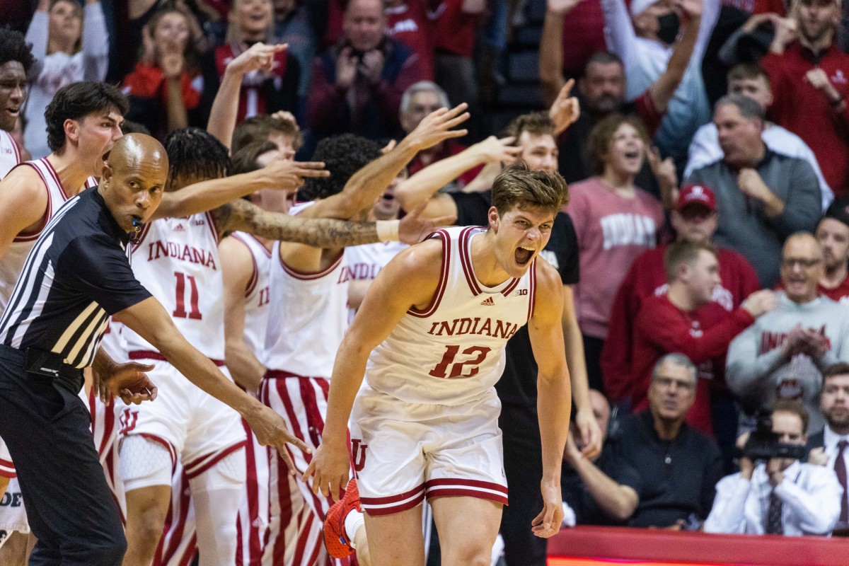 Miller Kopp (12) celebrates a made shot in the second half against the Michigan Wolverines.