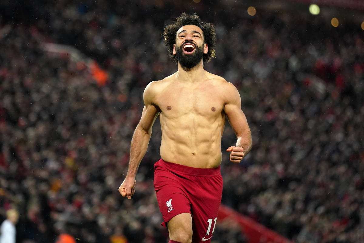 A shirtless Mo Salah pictured celebrating after scoring the 129th EPL goal of his Liverpool career during a 7-0 win over Manchester United in March 2023