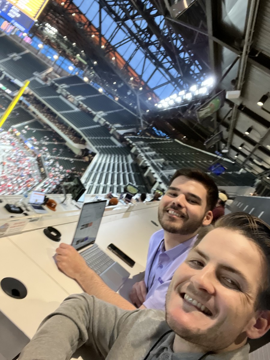Jake Peterson and Zion Trammell in the press box at the College Baseball Showdown at Globe Life Field in February. 