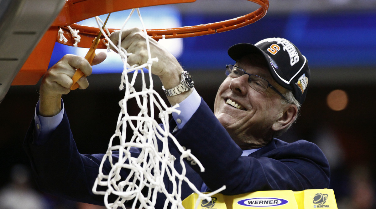 Syracuse basketball coach Jim Boeheim cuts down the nets after advancing to the 2013 Final Four