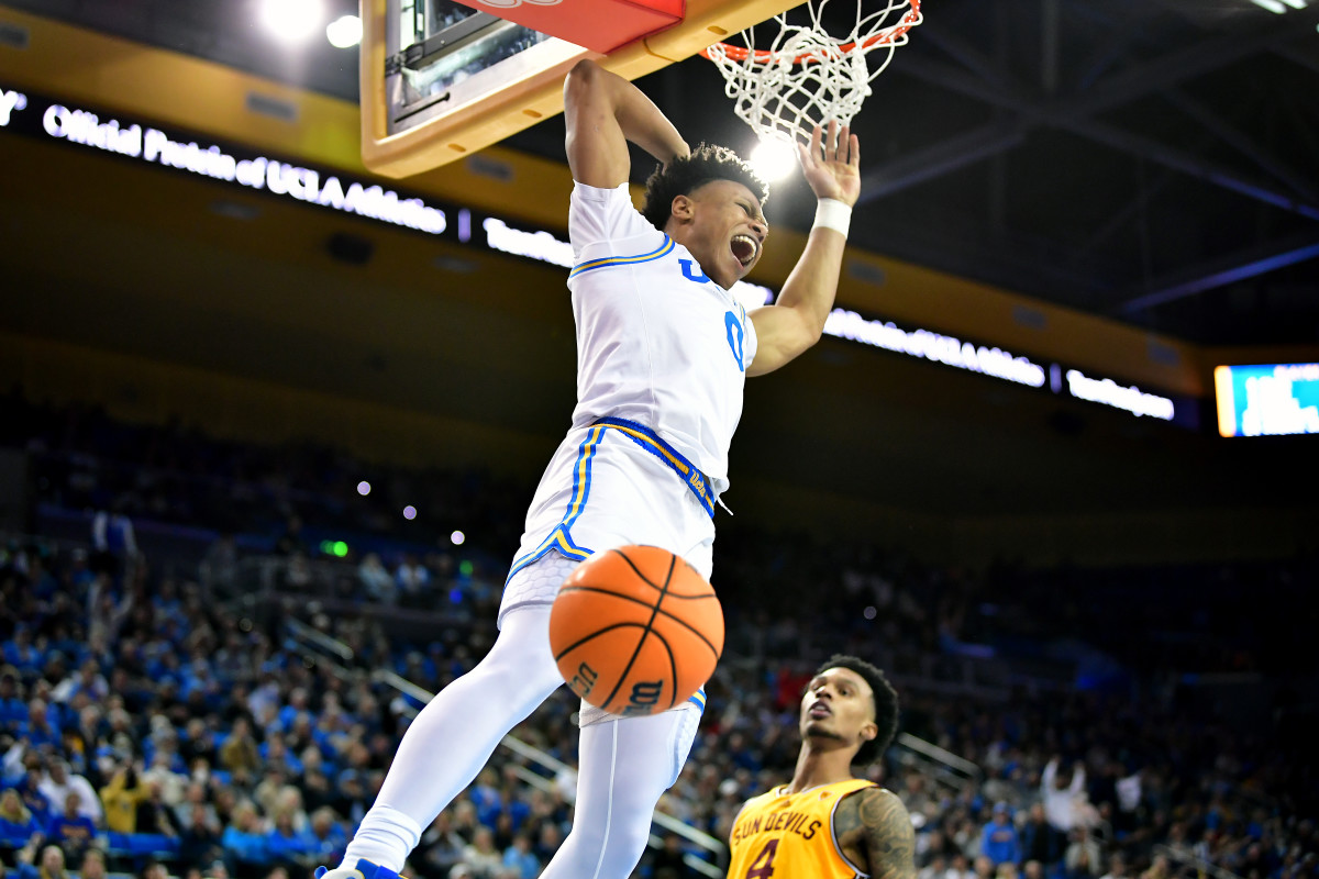 UCLA’s Jaylen Clark comes down from a jump under the rim