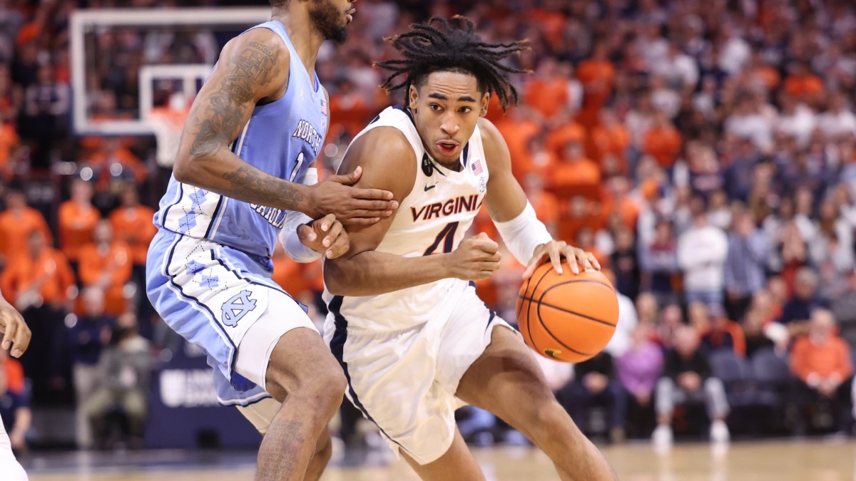 Armaan Franklin drives the ball with Leaky Black defending during the Virginia men's basketball game against North Carolina at John Paul Jones Arena.