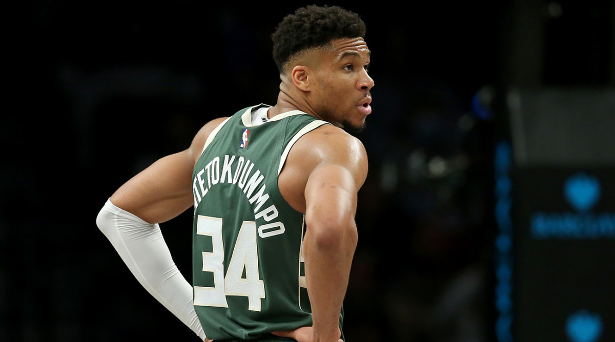 Milwaukee Bucks forward Giannis Antetokounmpo (34) reacts during the first quarter against the Brooklyn Nets at Barclays Center.
