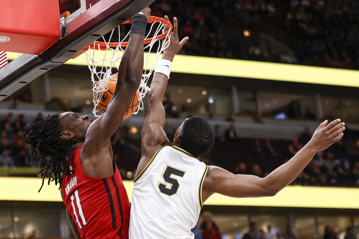 Clifford Omoruyi (11) scores against Purdue Boilermakers guard Brandon Newman (5) during the first half at United Center.