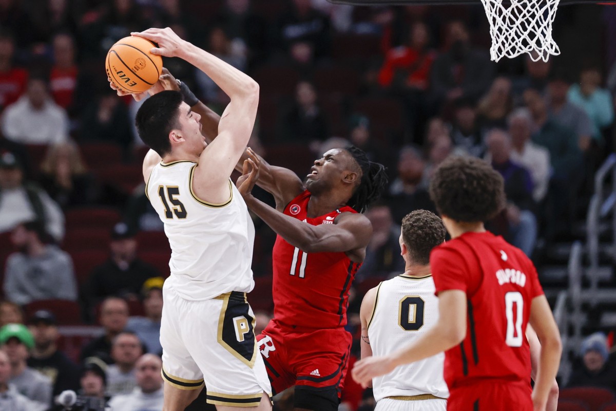 Clifford Omoruyi (11) defends against Purdue Boilermakers center Zach Edey (15) during the first half at United Center.