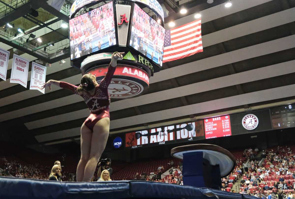 Alabama gymnast Shallon Olsen sticks the landing on her vault. Alabama defeated Boise State to wrap up the home schedule.