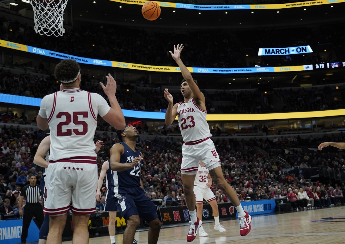 Indiana Hoosiers forward Trayce Jackson-Davis (23) is defended by Penn State Nittany Lions guard Jalen Pickett (22) during the first half at United Center.