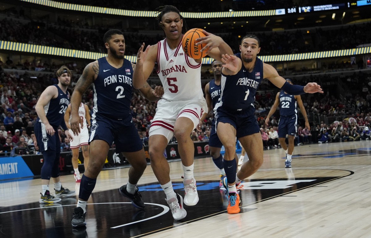 Nittany Lions guard Myles Dread (2) Penn State Nittany Lions guard Seth Lundy (1) defend Indiana Hoosiers forward Malik Reneau (5) during the first half at United Center.