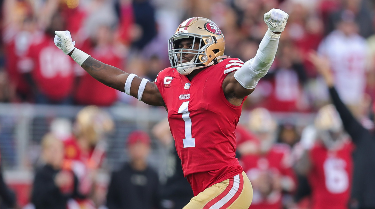 49ers cornerback Jimmie Ward celebrates with his arms raised