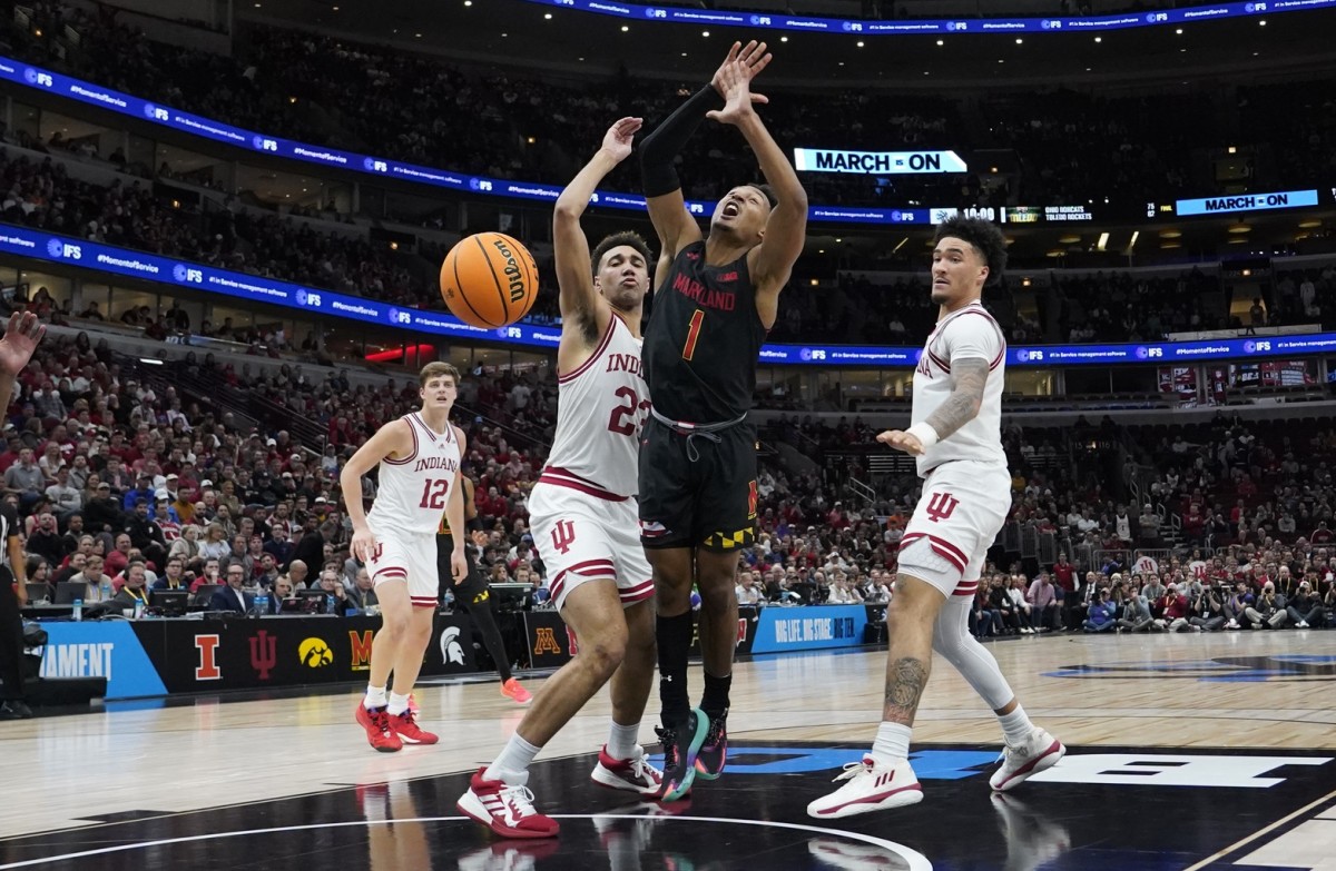 Mar 10, 2023; Chicago, IL, USA; Indiana Hoosiers forward Trayce Jackson-Davis (23) defends Maryland Terrapins guard Jahmir Young (1) during the second half at United Center.