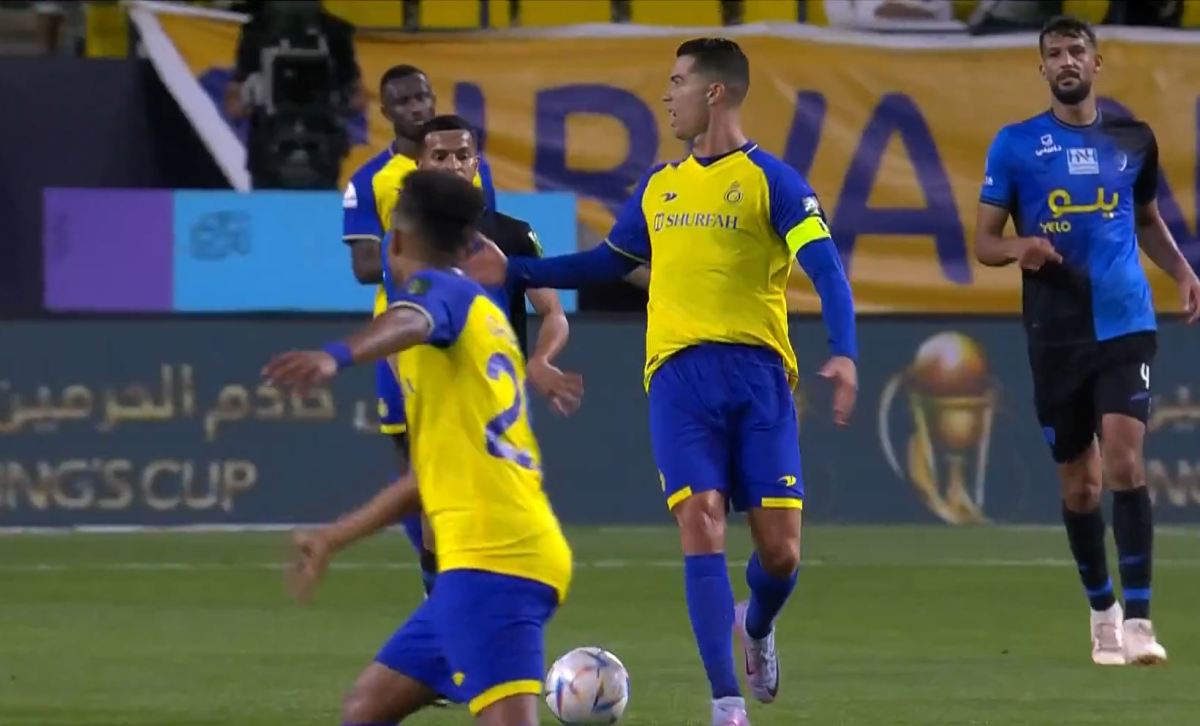 Cristiano Ronaldo pictured (center) looking angrily towards the referee (not in shot) after he blew his whistle for half-time while Al Nassr were in possession against Abha during a game in March 2023