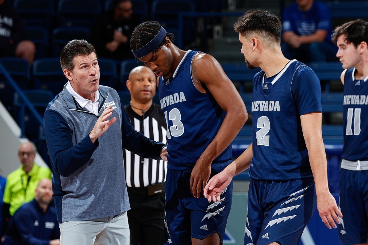 Nevada Wolf Pack head coach Steve Alford talks with guard Kenan Blackshear (13) and guard Jarod Lucas (2) in the second half against the Air Force Falcons at Clune Arena.