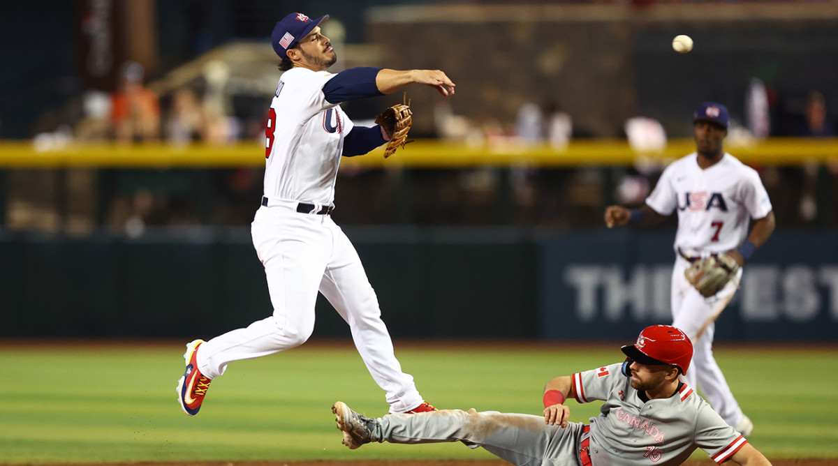 Team USA’s Nolan Arenado turns a double play in the World Baseball Classic.