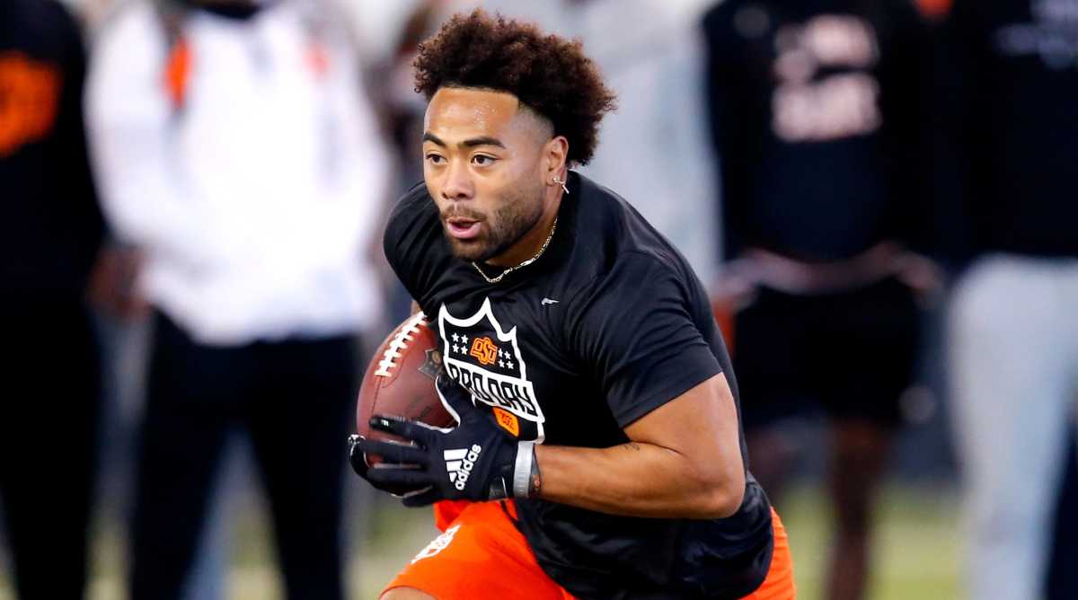 Former Oklahoma State running back Jaylen Warren works out at the school’s pro day