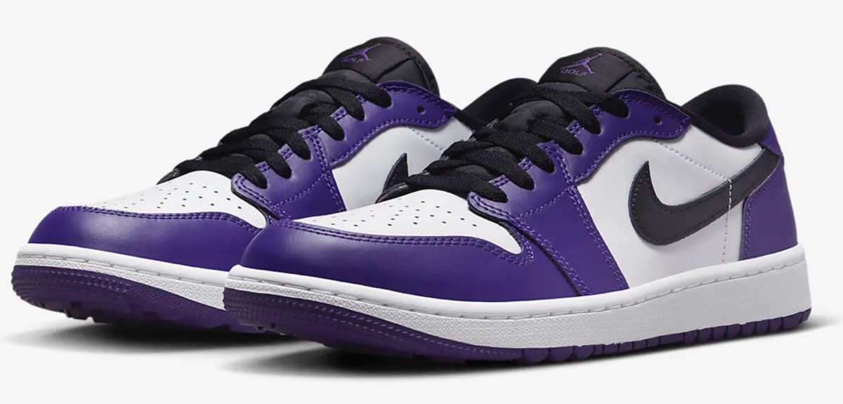 View of purple, white, and black Air Jordan shoes.