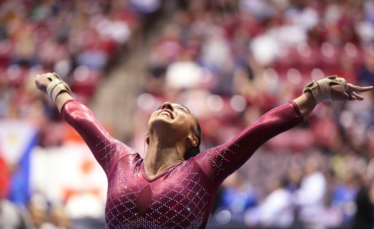 Alabama gymnast Luisa Blanco celebrates after sticking her landing from the vault. Alabama defeated Boise State to wrap up the home schedule. Gymnastics Alabama Vs Boise State