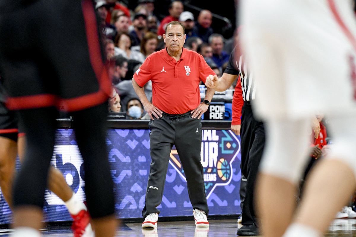 Kelvin Sampson watches his Houston team from courtside.