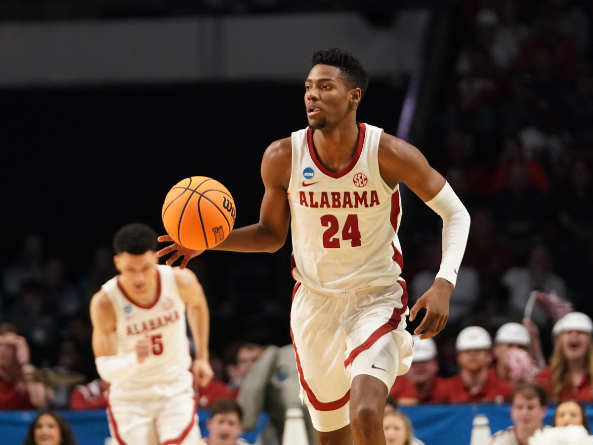 Mar 16, 2023; Birmingham, AL, USA; Alabama Crimson Tide forward Brandon Miller (24) brings the ball up against the Texas A&M-CC Islanders during the first half in the first round of the 2023 NCAA Tournament at Legacy Arena. Mandatory Credit: Marvin Gentry-USA TODAY Sports