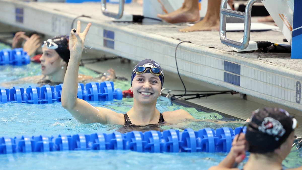 Kate Douglass celebrates after helping Virginia win the NCAA title in the 200-yard medley relay at the 2023 NCAA Women's Swimming & Diving Championships in Knoxville, Tennessee.