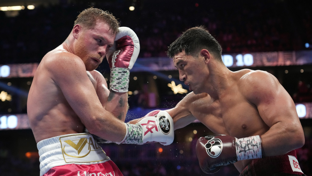 Canelo Alvarez and Dimitry Bivol box during their light heavyweight championship bout at T-Mobile Arena.