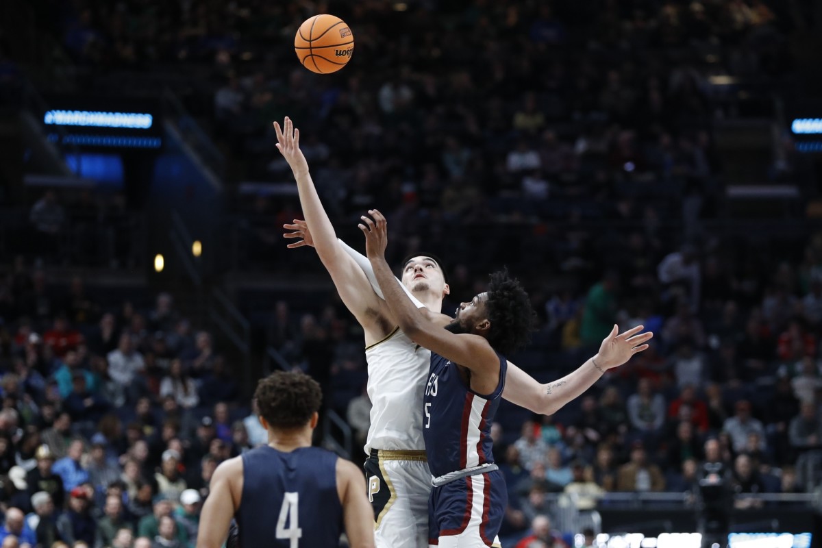 Purdue Boilermakers center Zach Edey (15) goes up for the tip off with Fairleigh Dickinson Knights forward Ansley Almonor (5) in the first half at Nationwide Arena.
