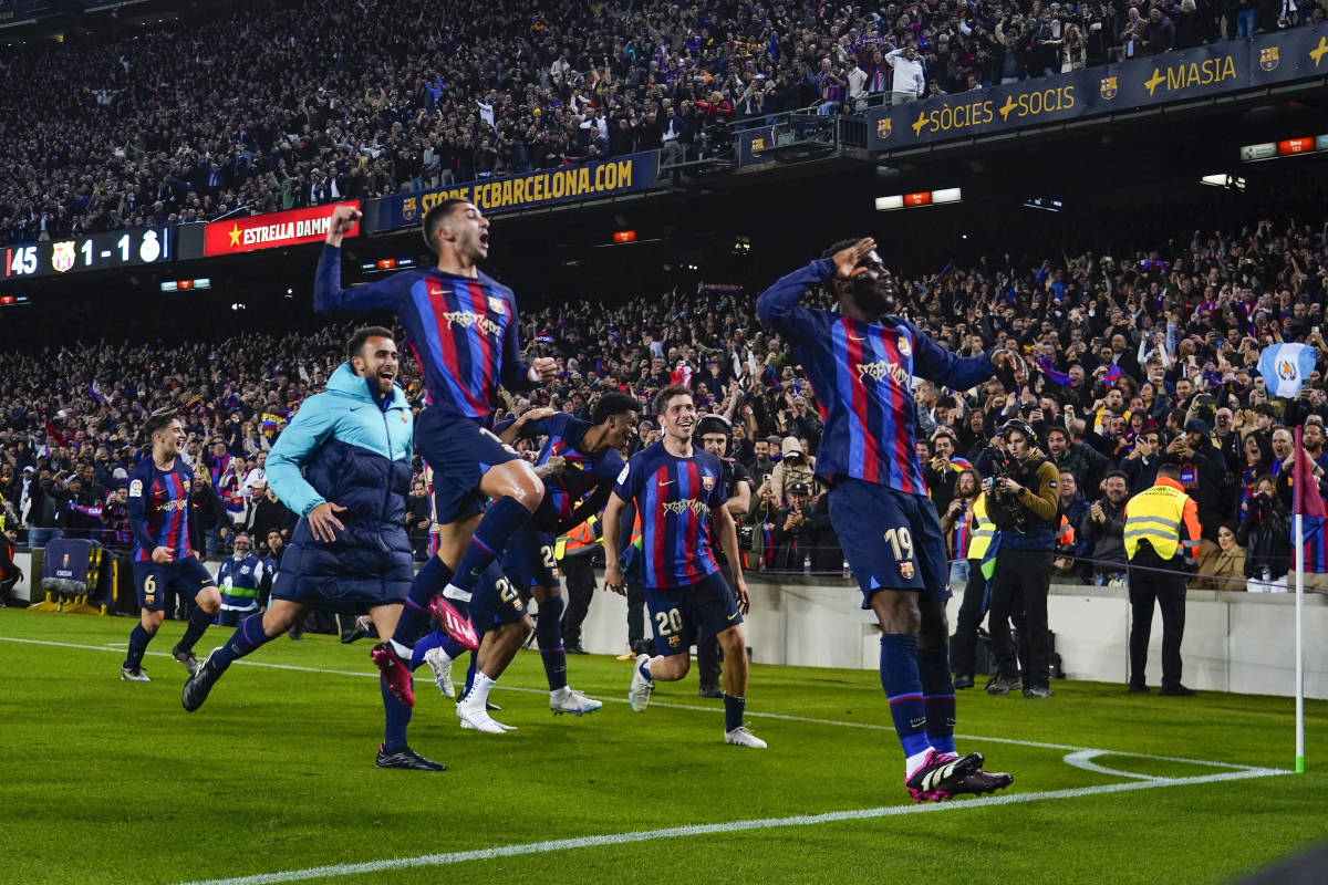 Franck Kessie pictured (right) celebrating after scoring the winning goal for Barcelona in a 2-1 victory over Real Madrid in March 2023