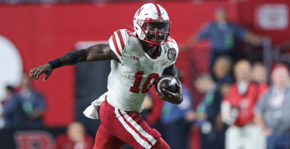 Nebraska Cornhuskers running back Anthony Grant on a carry during a college football game.