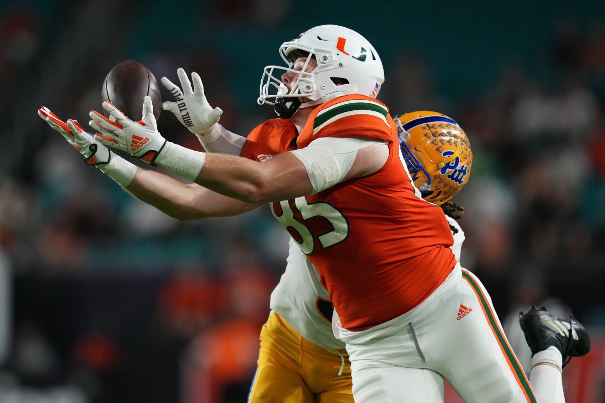 Nov 26, 2022; Miami Gardens, Florida, USA; Miami Hurricanes tight end Will Mallory (85) makes a catch against the Pittsburgh Panthers during the first half at Hard Rock Stadium. Mandatory Credit: Jasen Vinlove-USA TODAY Sports