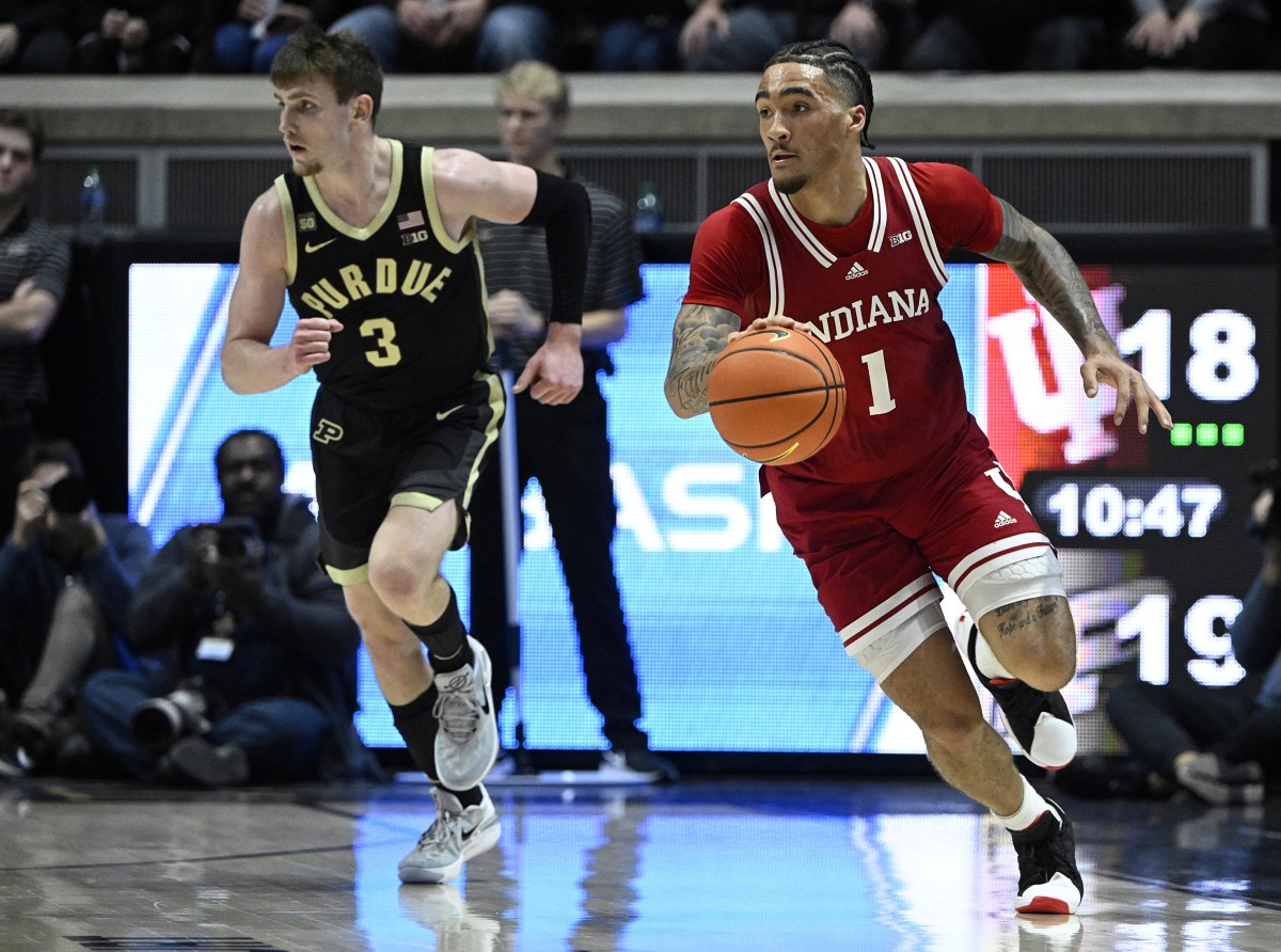 Indiana Hoosiers guard Jalen Hood-Schifino (1) dribbles the ball against Purdue Boilermakers guard Braden Smith (3) during the first half at Mackey Arena.
