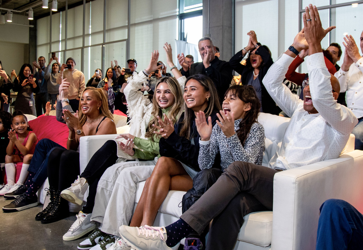 Alyssa Thompson sits with her sisters as she is taken No. 1 in the 2023 NWSL draft, selected by Angel City FC.