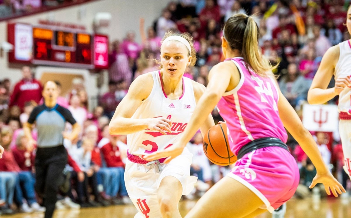 Indiana's Grace Berger (34) drives on Iowa's Gabbie Marshall (24) during the second half of the Indiana versus Iowa women's basketball game at Simon Skjodt Assembly Hall on Thursday, Feb. 9, 2023.