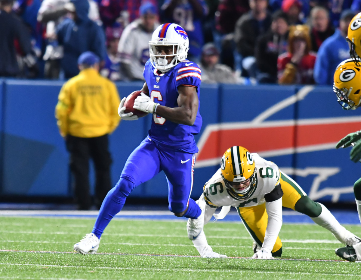 Oct 30, 2022; Orchard Park, New York, USA; Buffalo Bills wide receiver Isaiah McKenzie (6) returns a kickoff as Green Bay Packers safety Dallin Leavitt (6) misses a tackle in the third quarter at Highmark Stadium. Mandatory Credit: Mark Konezny-USA TODAY Sports