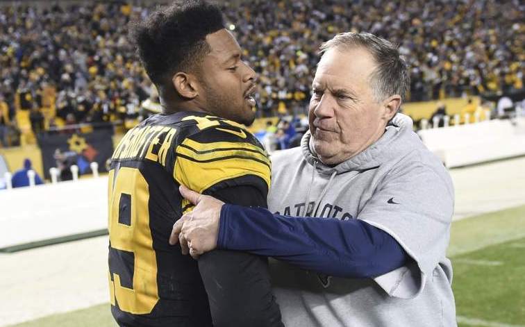 Smith-Schuster, then with the Steelers, and Patriots coach Bill Belichick share an embrace after a game in 2018.