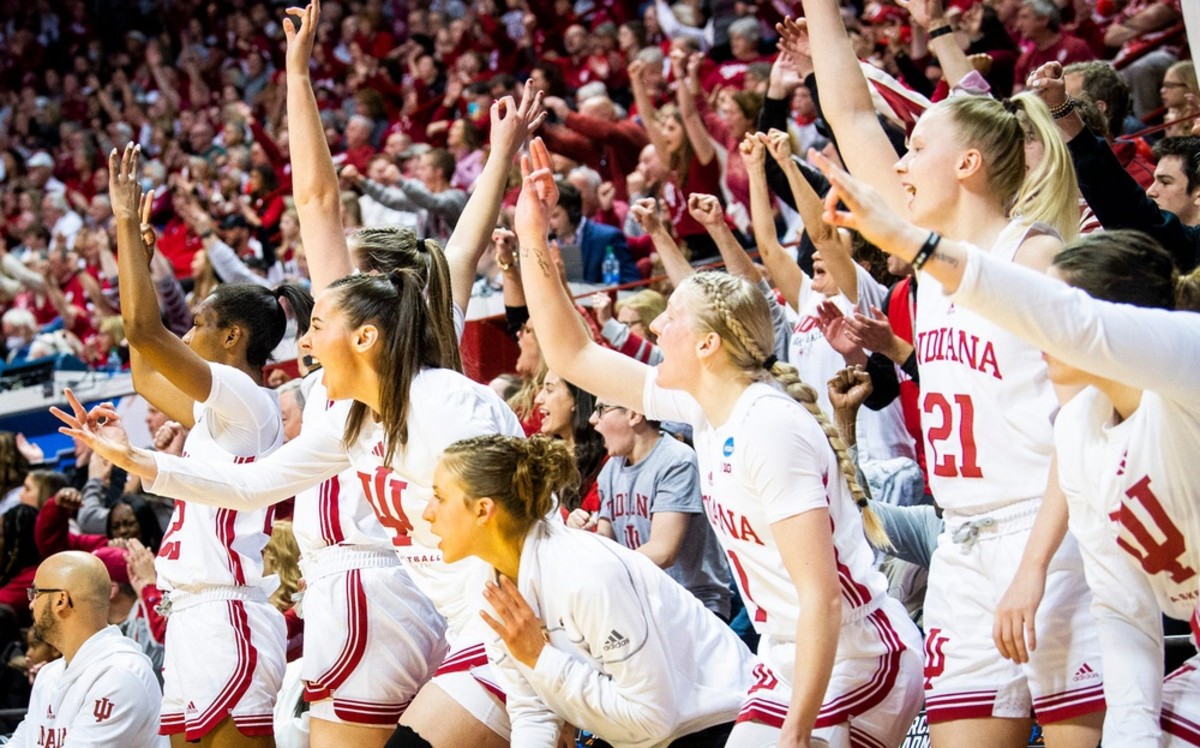 Indiana's Mackenzie Holmes (54), third from the left, holds up three fingers along with the rest of the bench after a Yarden Garzon shot during the first round of the NCAA women's tournament at Simon Skjodt Assembly Hall on Saturday, March 18, 2023. Indiana defeated Tennessee Tech 77-47 to advance to the second round.