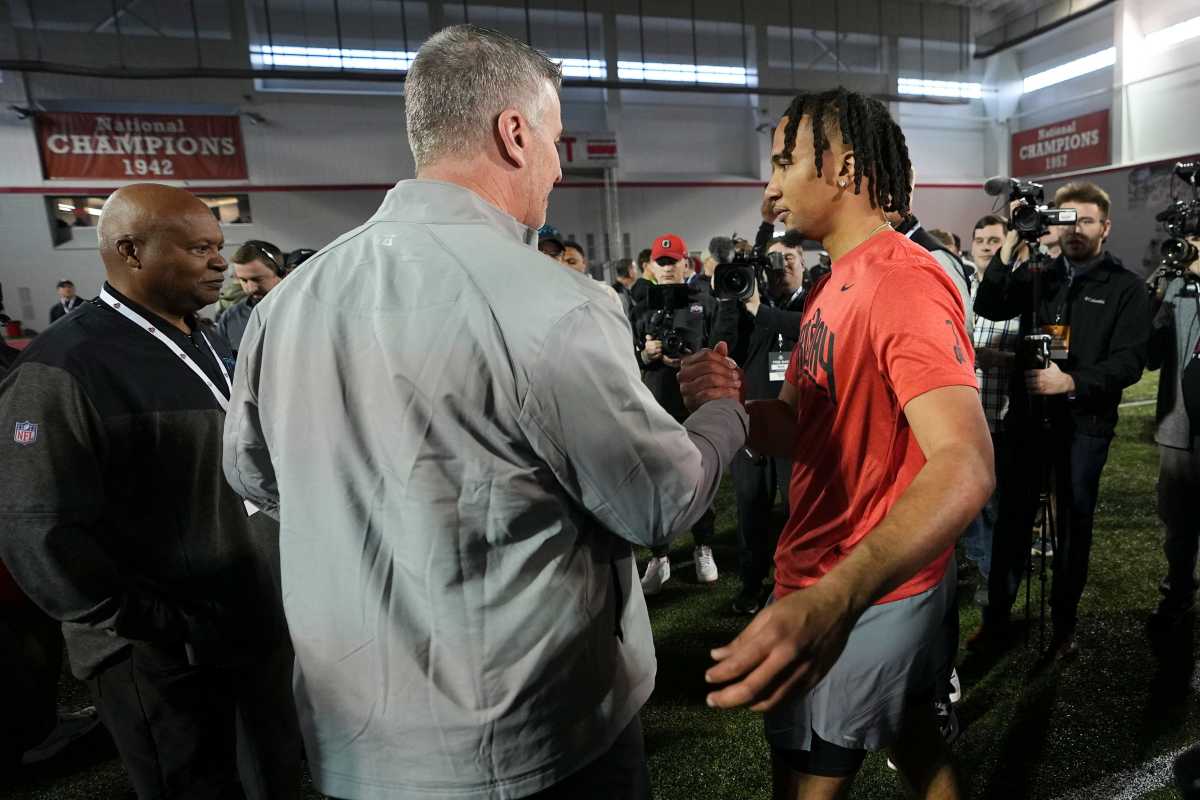 Ohio State Buckeyes quarterback C.J. Stroud talks to Carolina Panthers head coach Frank Reich